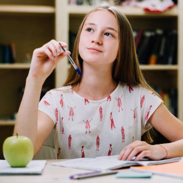 dreamy-studying-teen-girl